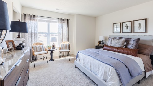 Bedroom in modern, open concept new home