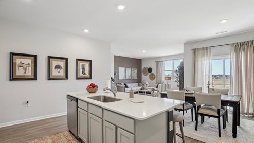 Modern kitchen with quartz countertops and stainless steel appliances