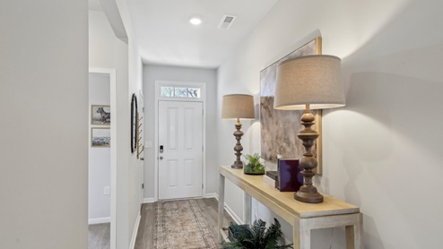 Entry to modern, open concept floorplan