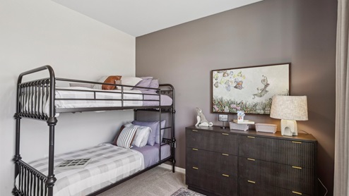 Bedroom in modern, open concept new home