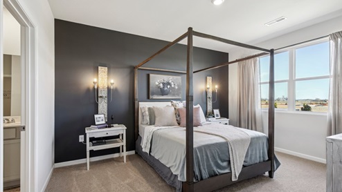 Bedroom in modern, open concept new home