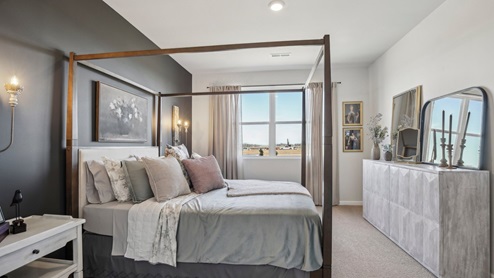 Bedroom in modern, open concept new home