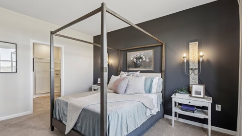 Bedroom in modern, open concept new home