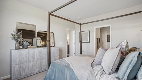 Bedroom in modern, open concept new home