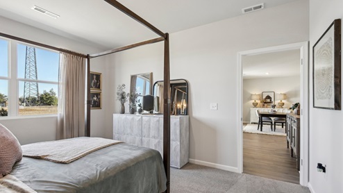 Bedroom in modern, open concept new home
