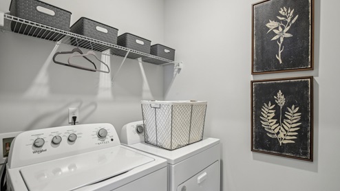 Laundry room in new single family home
