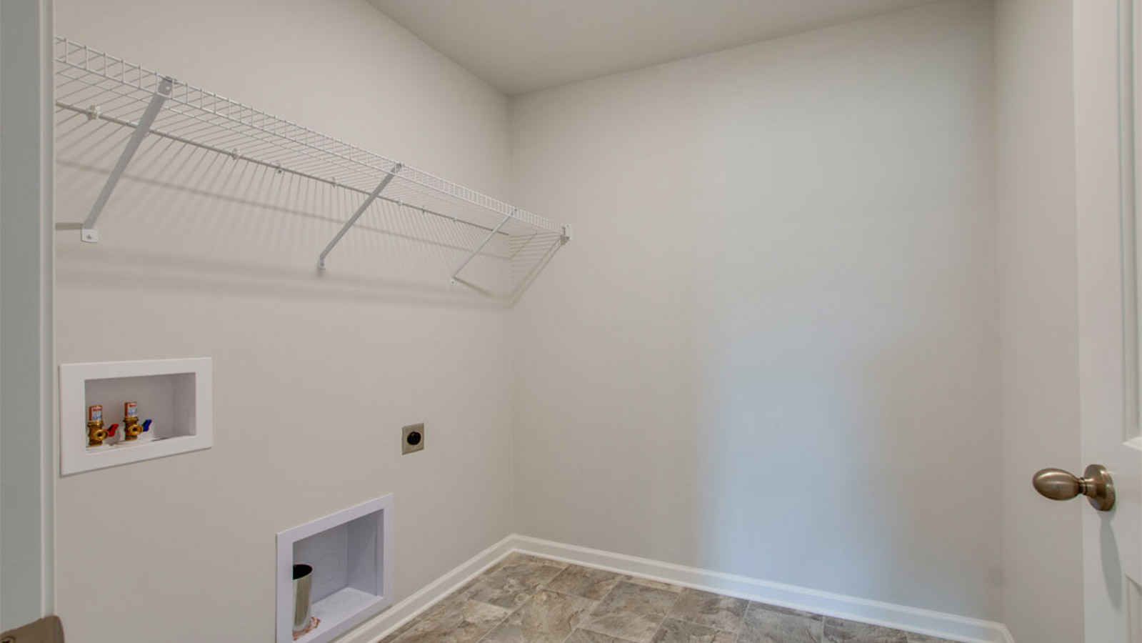 Laundry room in new two story home