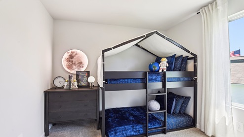 Bedroom in modern, open concept new home