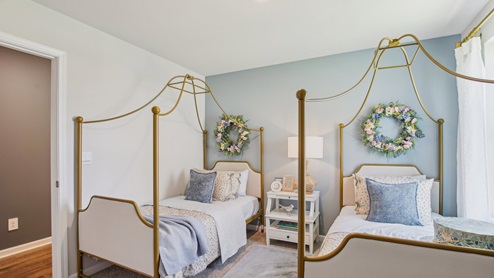 Bedroom in modern, open concept new home