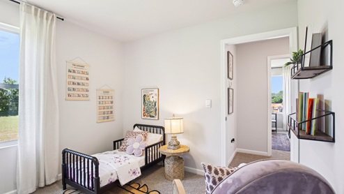 Bedroom in modern, open concept new home