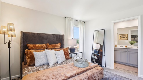 Primary bedroom in modern, open concept new build home