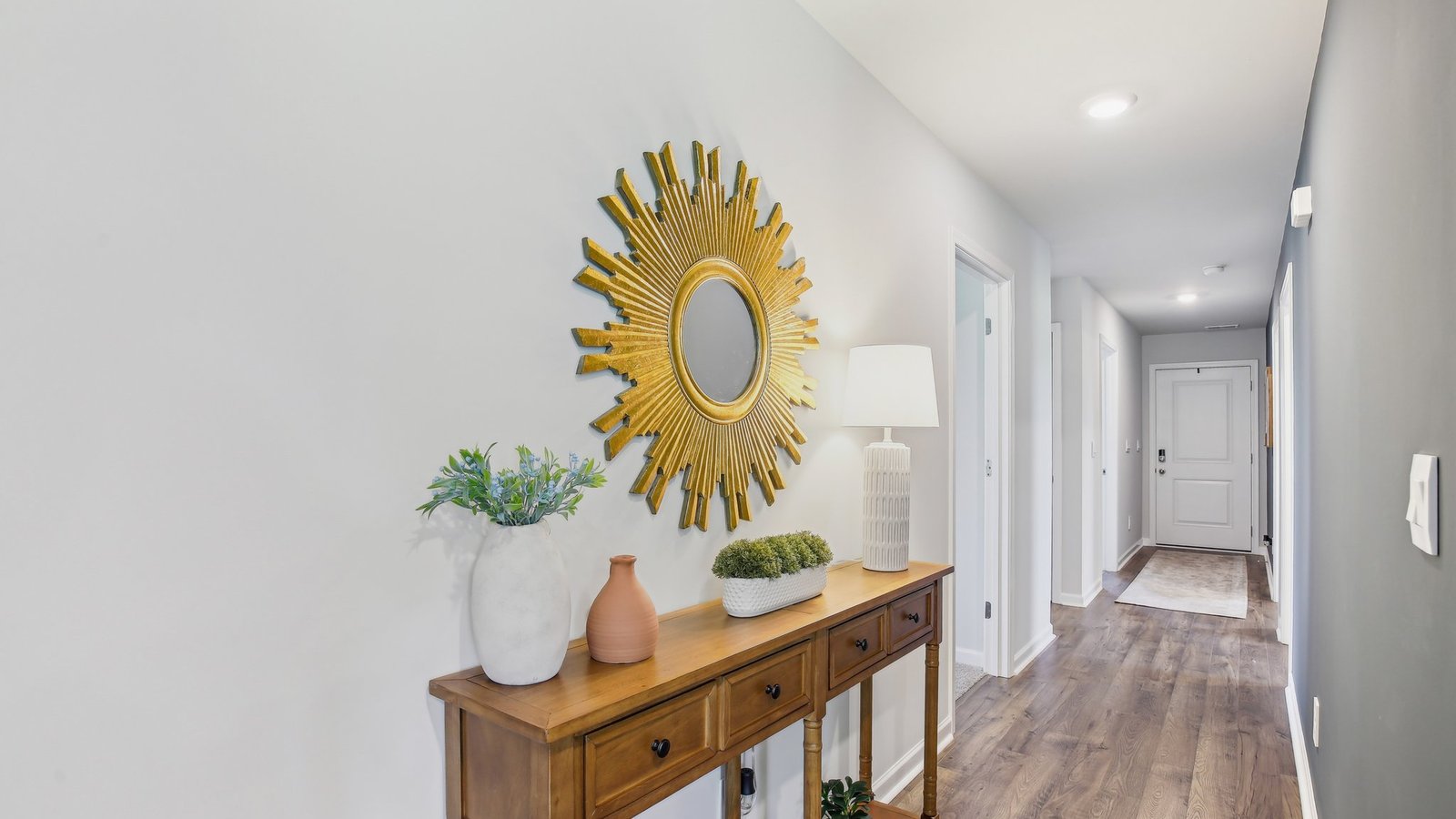 Entry to modern, open concept floorplan