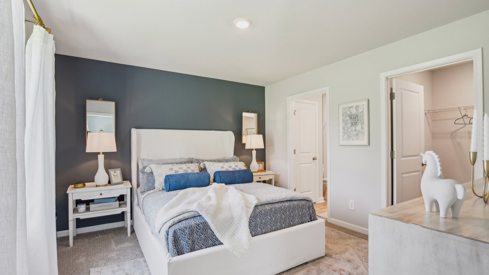 Primary bedroom in modern, open concept new build home