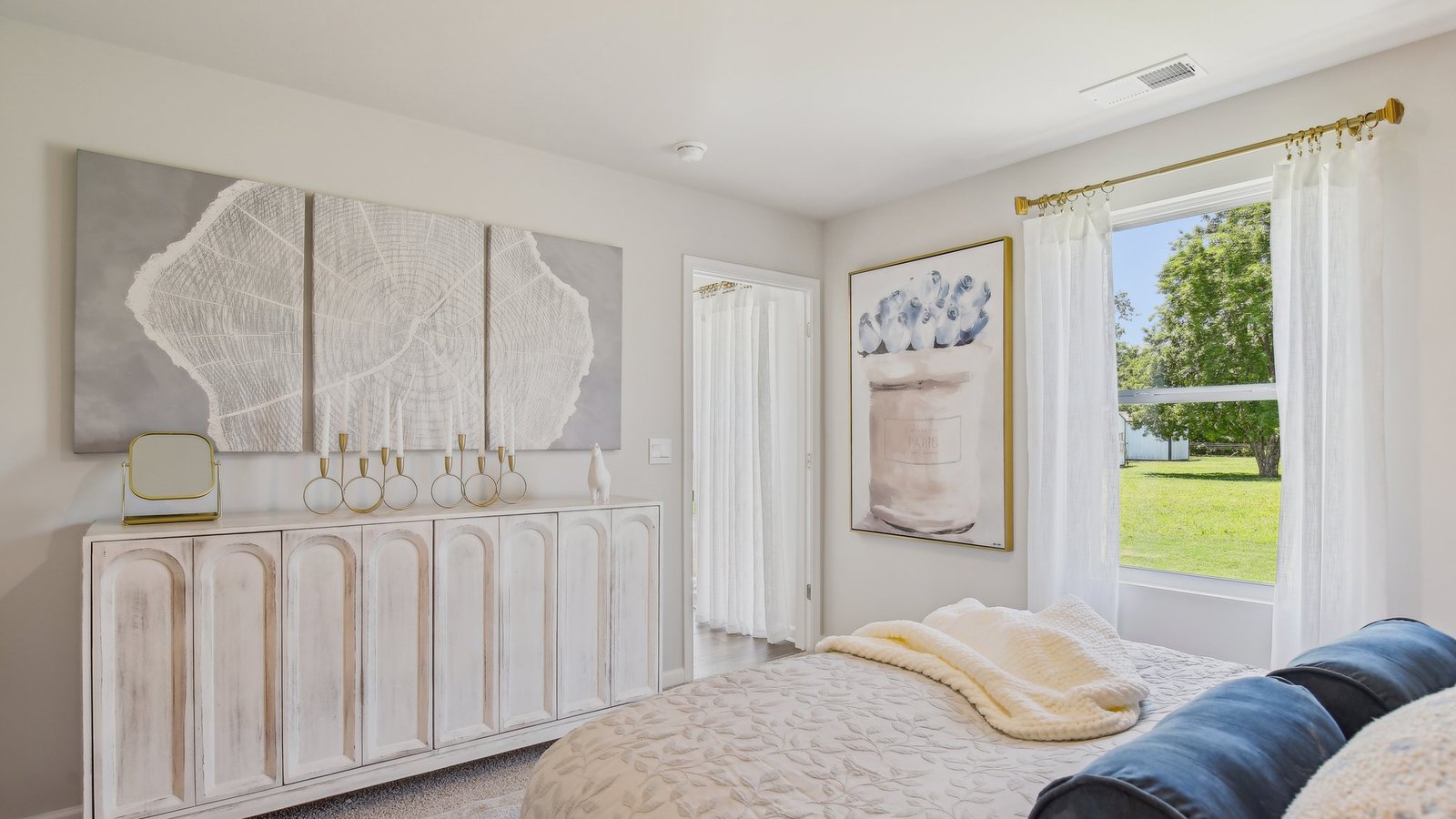 Primary bedroom in modern, open concept new build home