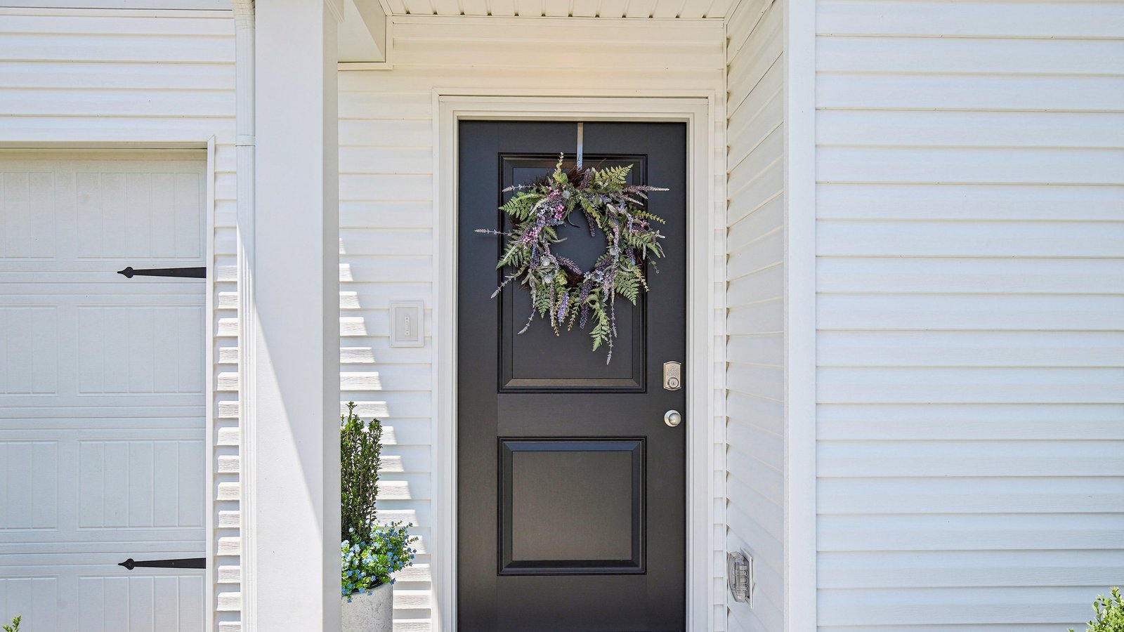 Entry to modern, open concept floorplan