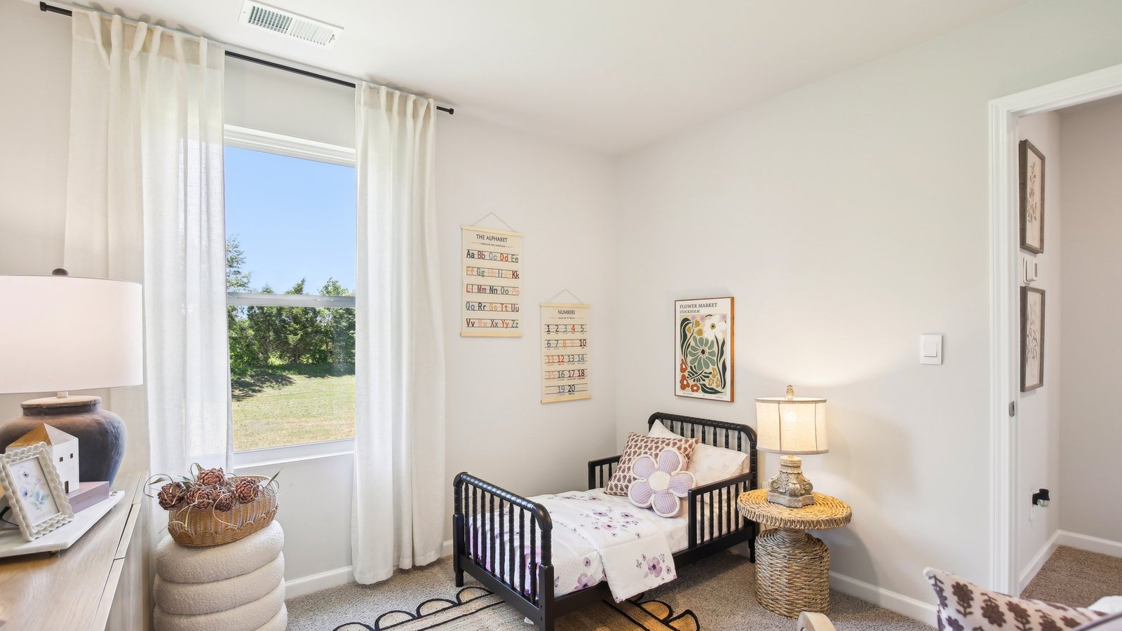 Secondary bedroom, flex-office, study, entertainment, game, craft room options in this D.R. Horton new construction home