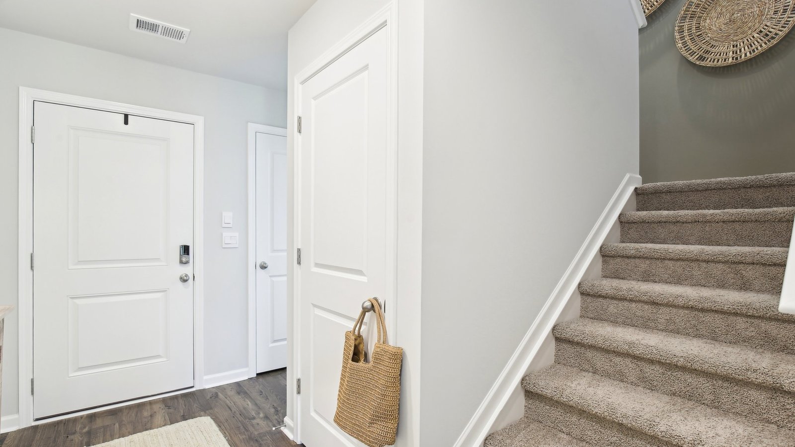 Entry to modern, open concept floorplan