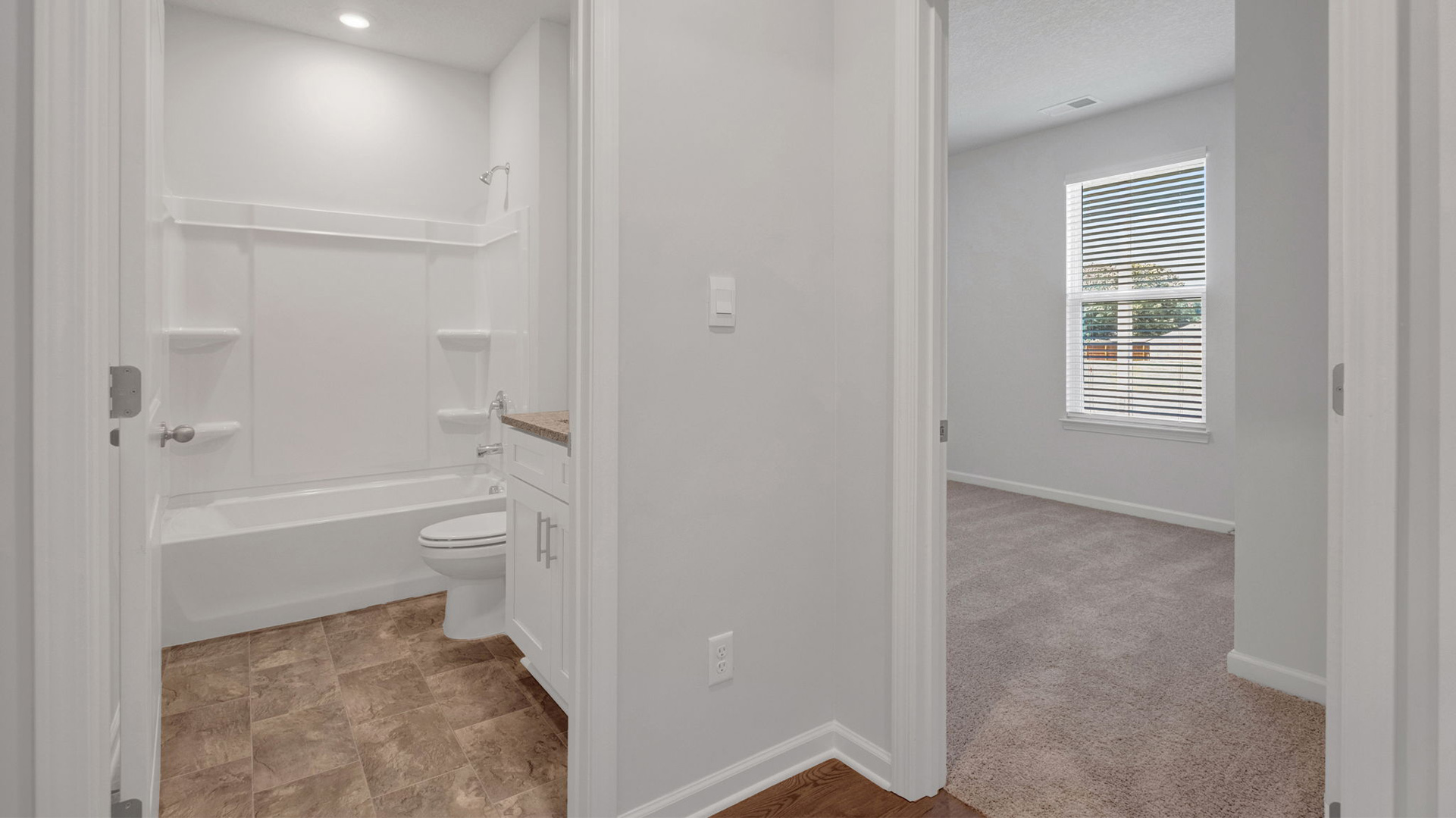 ENtry foyer leading into the secondary bedrooms