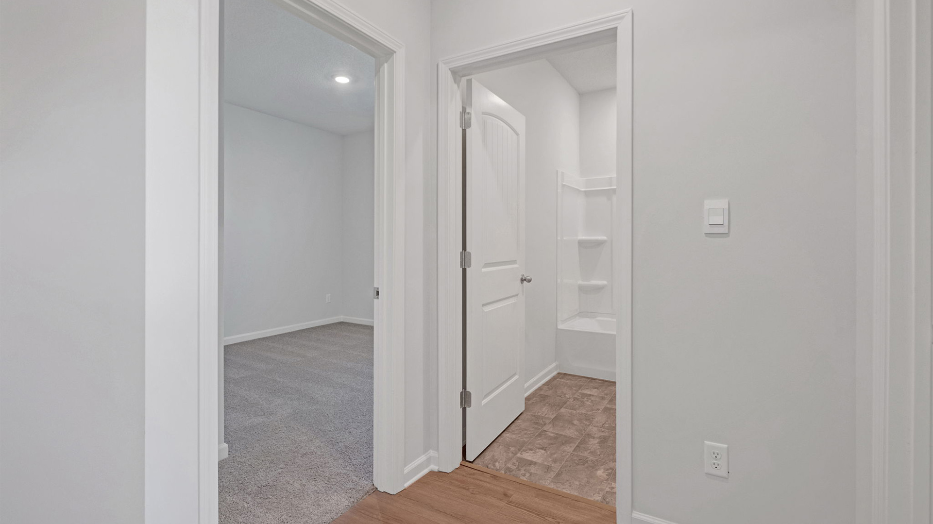 Foyer leading into the third bedroom