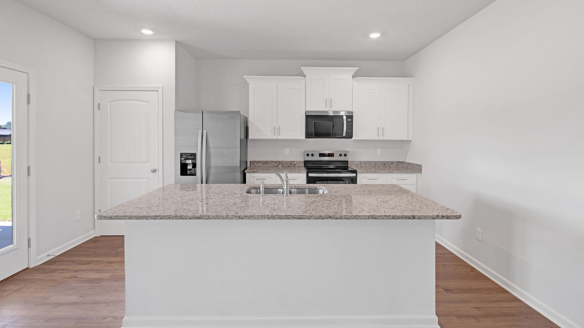 Kitchen with soft closing light cabinetry