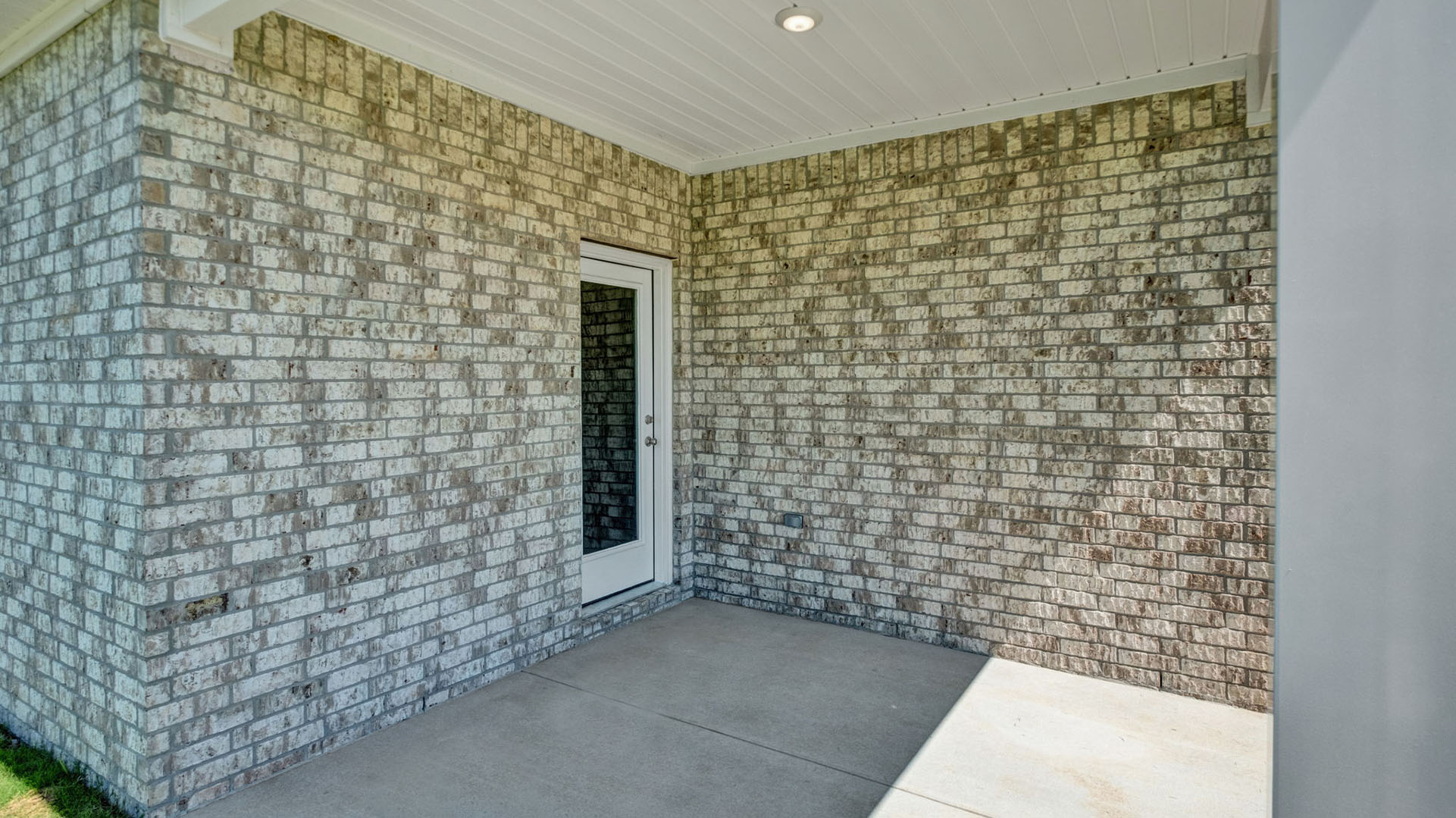 COvered back patio perfect for entertaining
