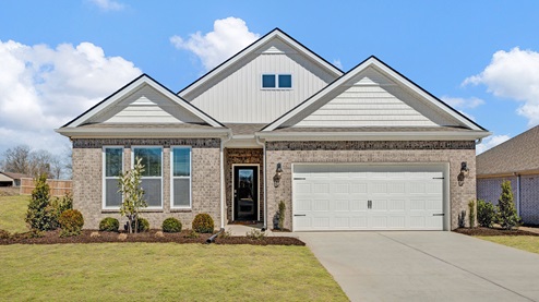 bristol model exterior elevation, a single story home with two car garage in village park community