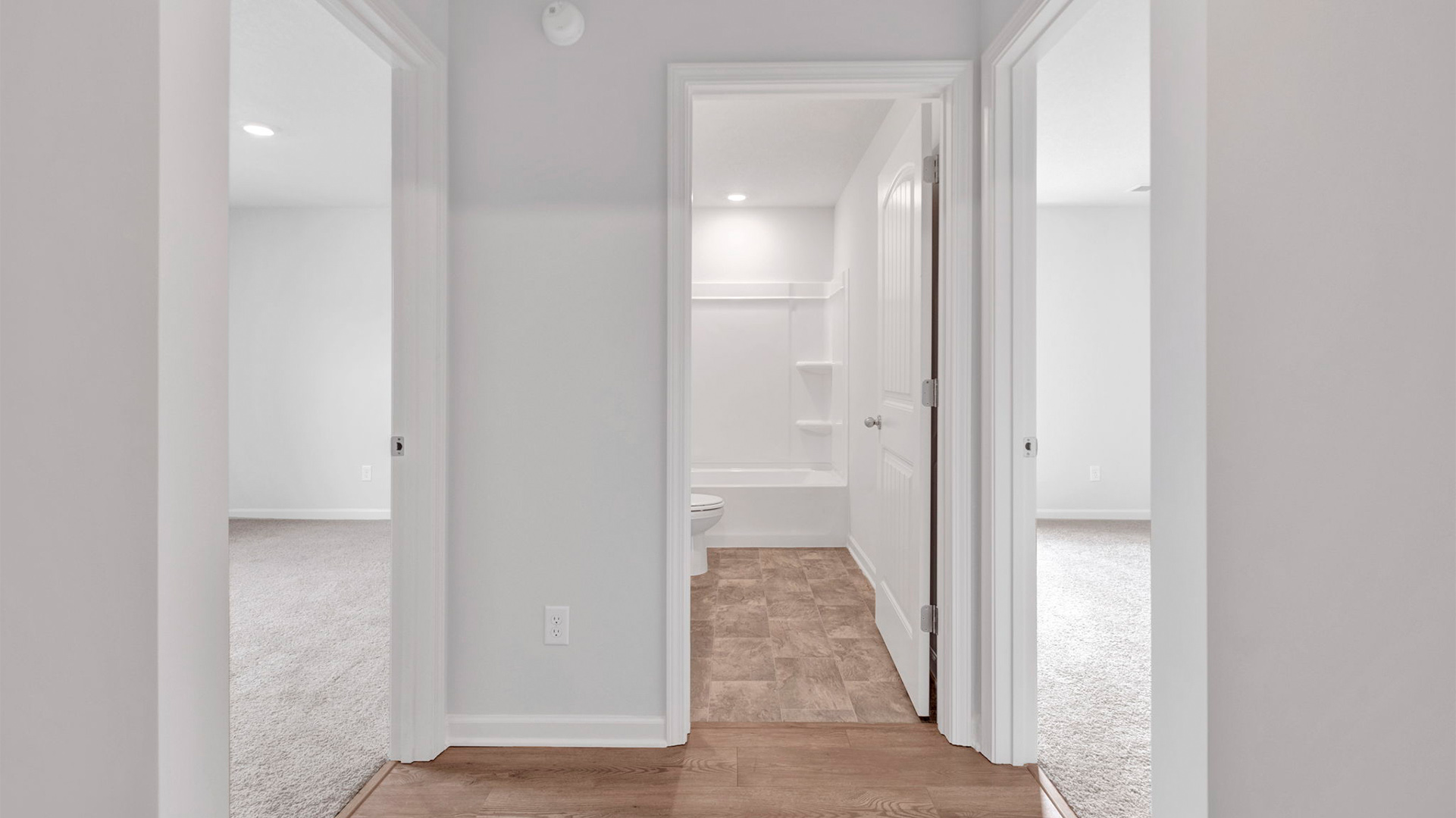 Foyer at the front of the home leading into the secondary bedrooms