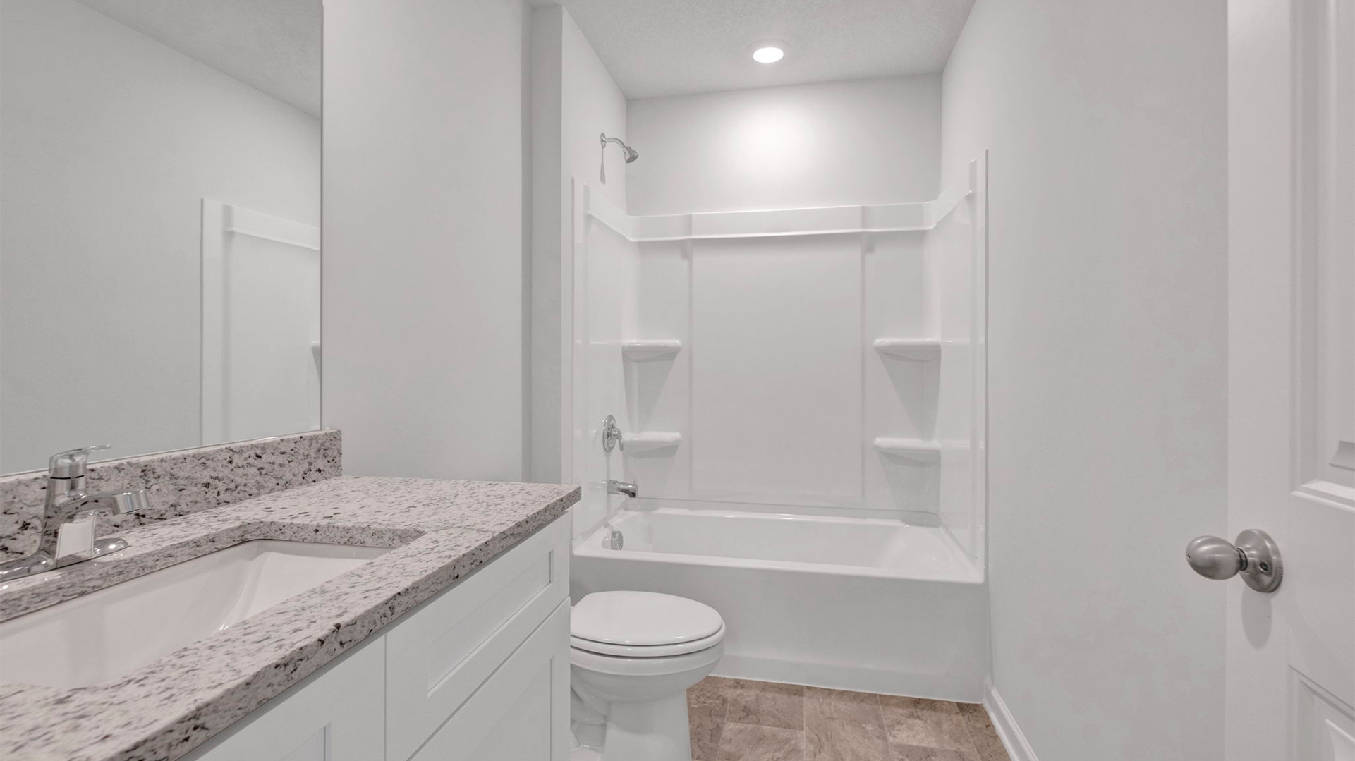 Second bathroom located in between both two guest bedrooms