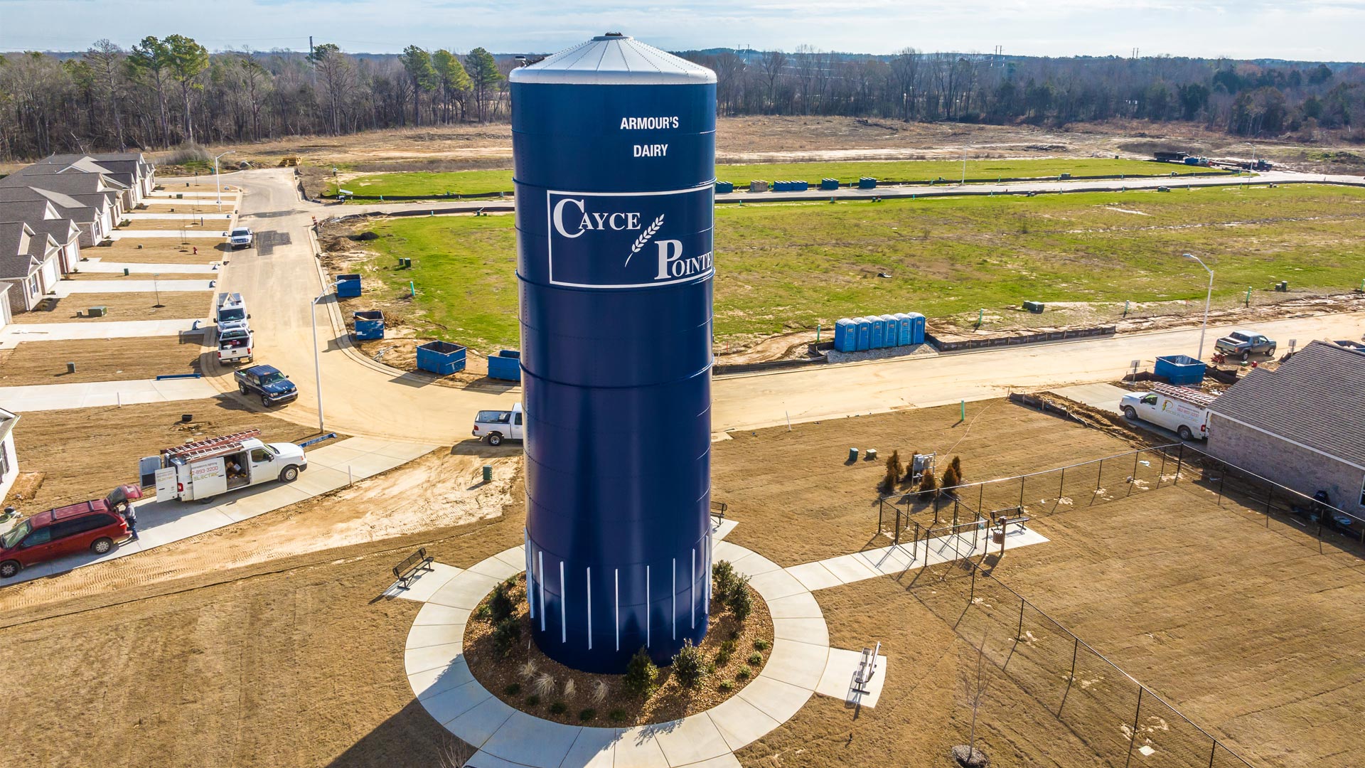 Cayce Pointe community water silo hovering over the dog park