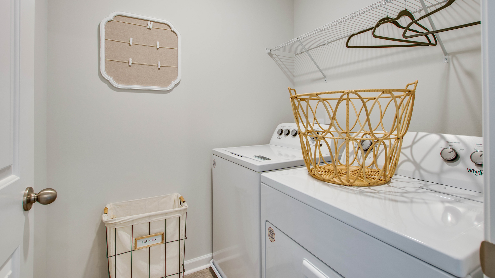 Laundry room with ventilated shelving