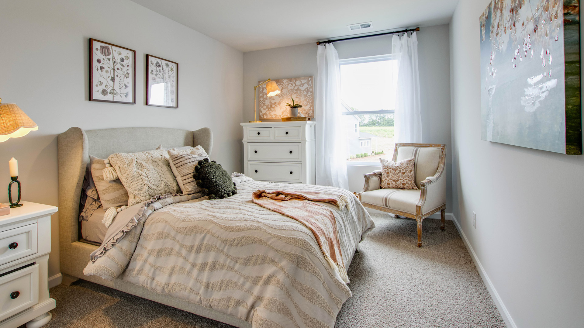 Second bedroom with carpet flooring and neutral walls