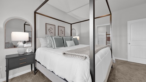 Primary bedroom comfortably fits a king size bed