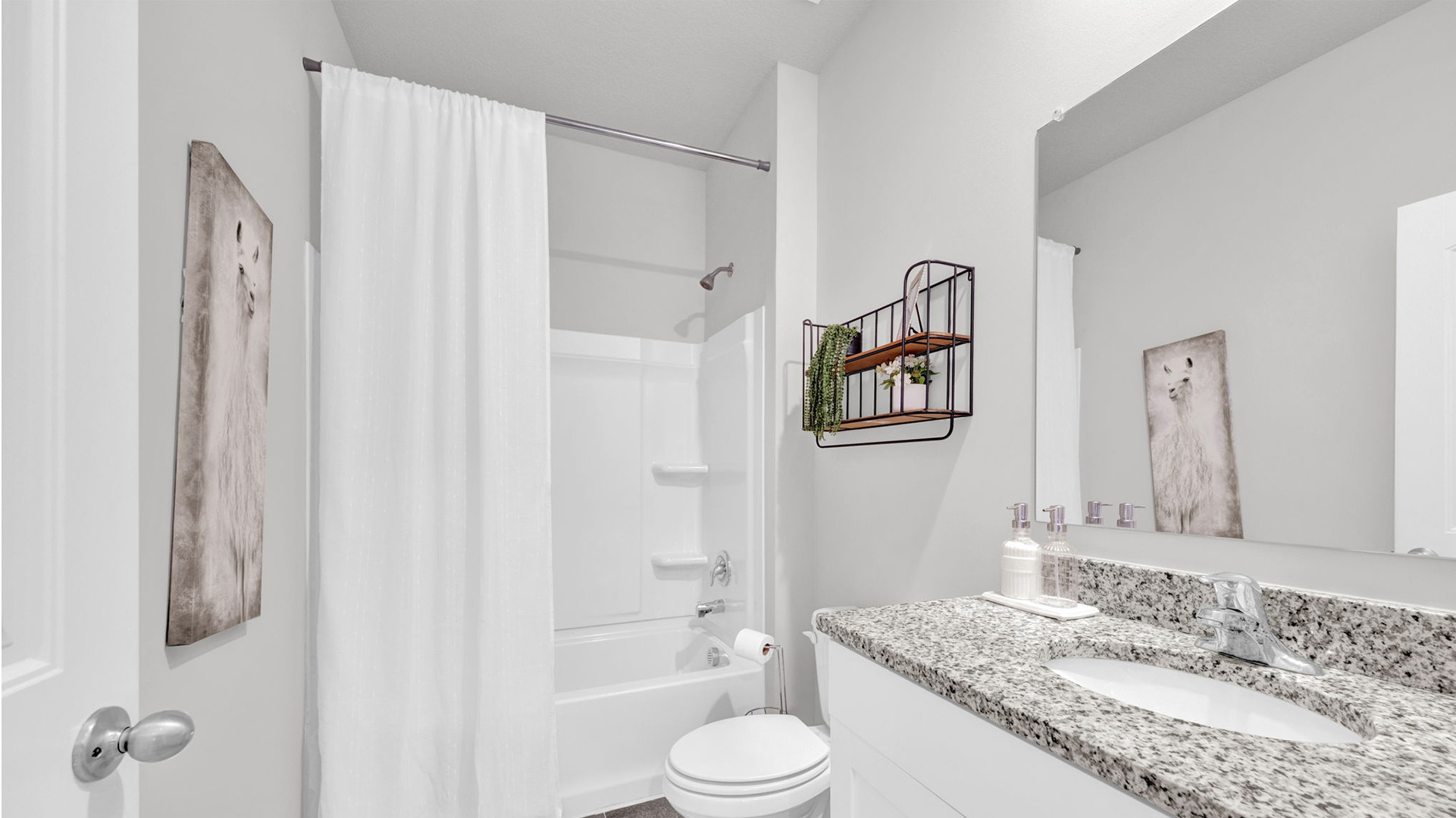 Second bathroom at the front of the home in between the first two guest bedrooms