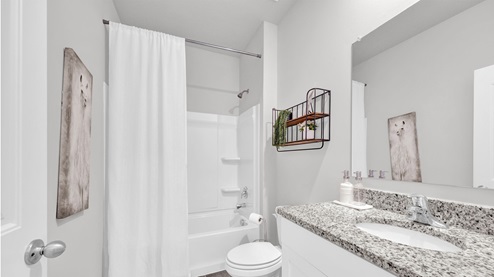 Second bathroom at the front of the home in between the first two guest bedrooms