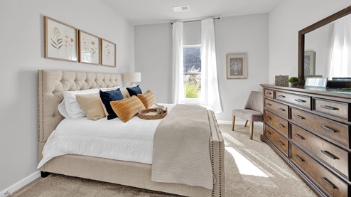 Fourth bedroom with a window for natural light