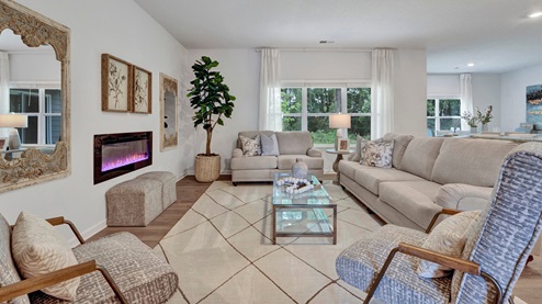 riverwood gardens new home community in oakland tennessee cairn plan living room with electric fireplace