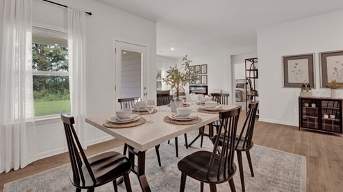riverwood gardens new home community in oakland tennessee cameron plan dining area overlooking living room