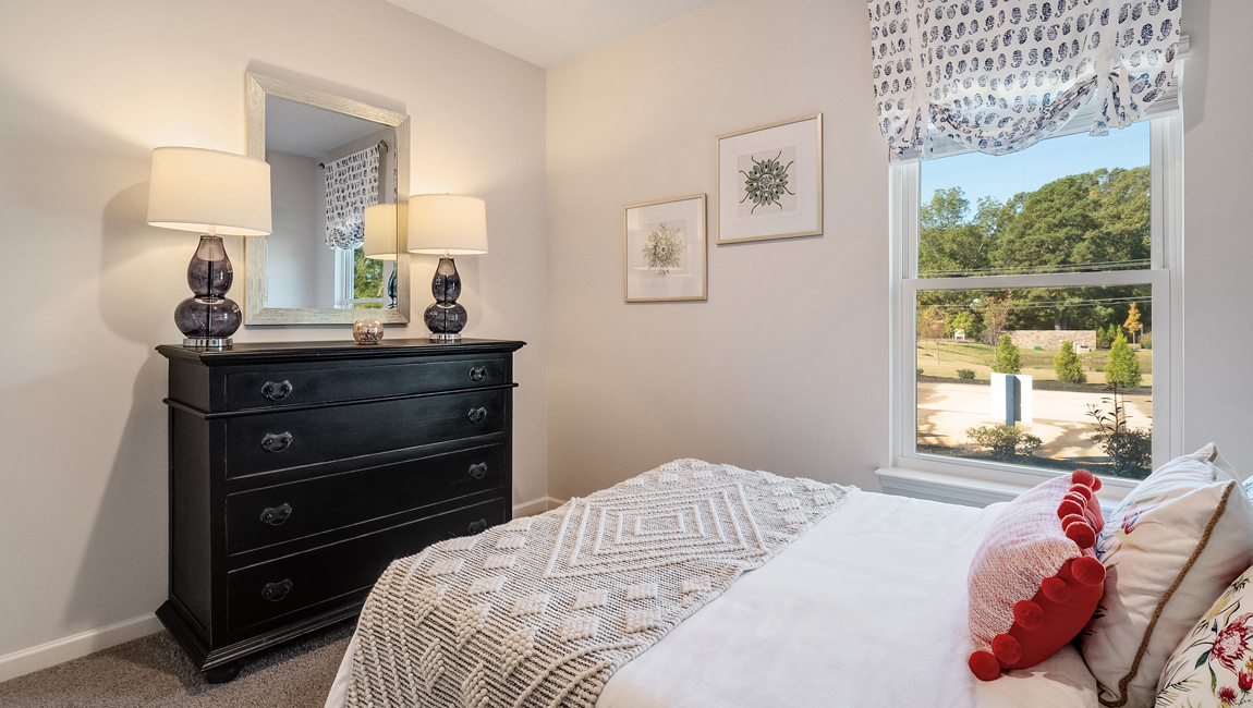 Second bedroom comfortably fitting a full size bed