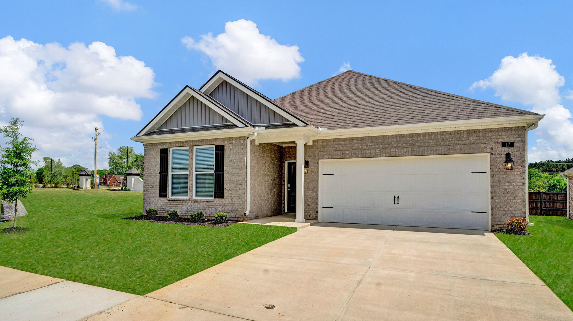 Exterior of the Cameron, a single story home with a two car garage