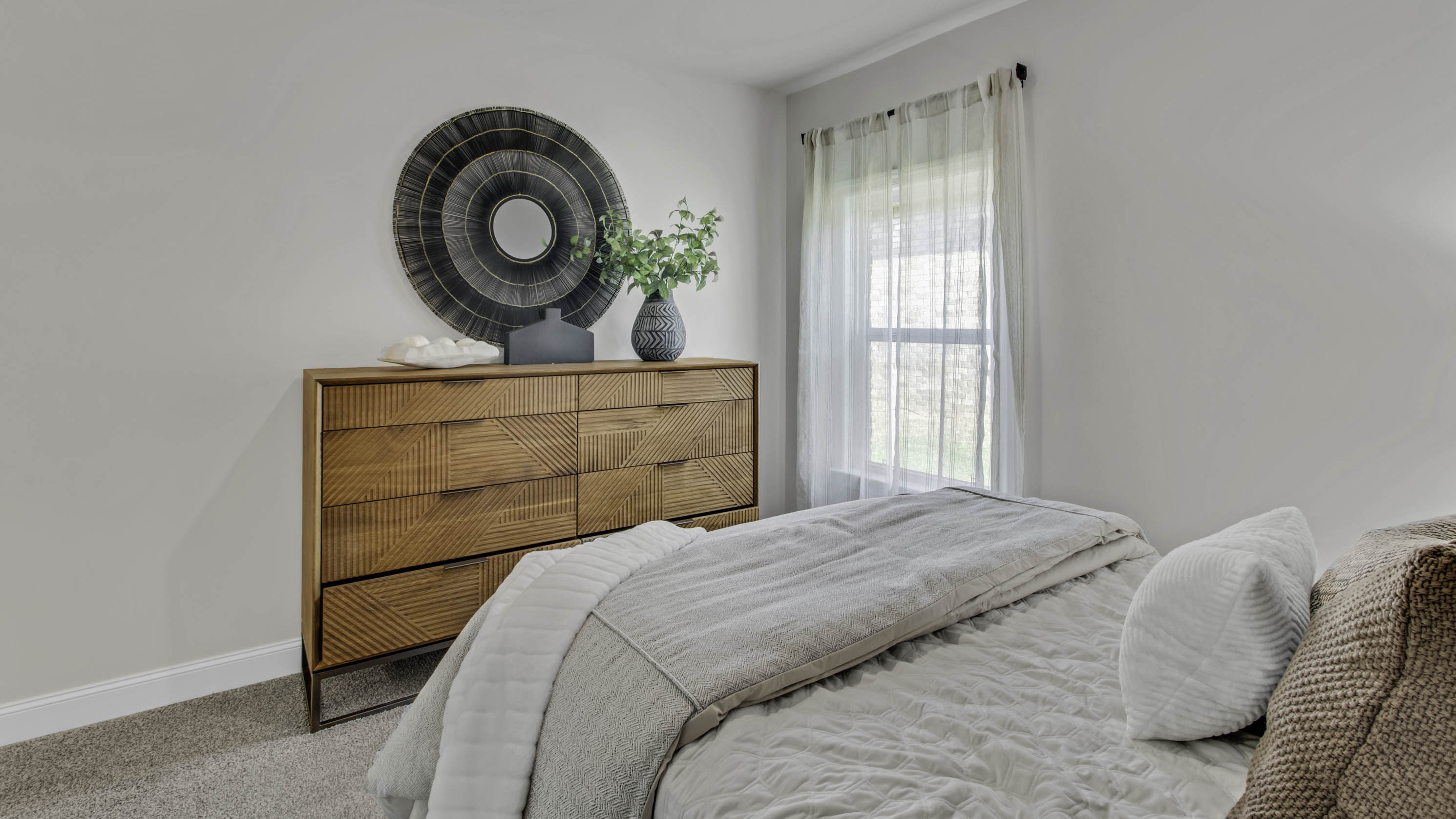 Fourth bedroom comfortably fitting a full size bed and additional bedroom furniture