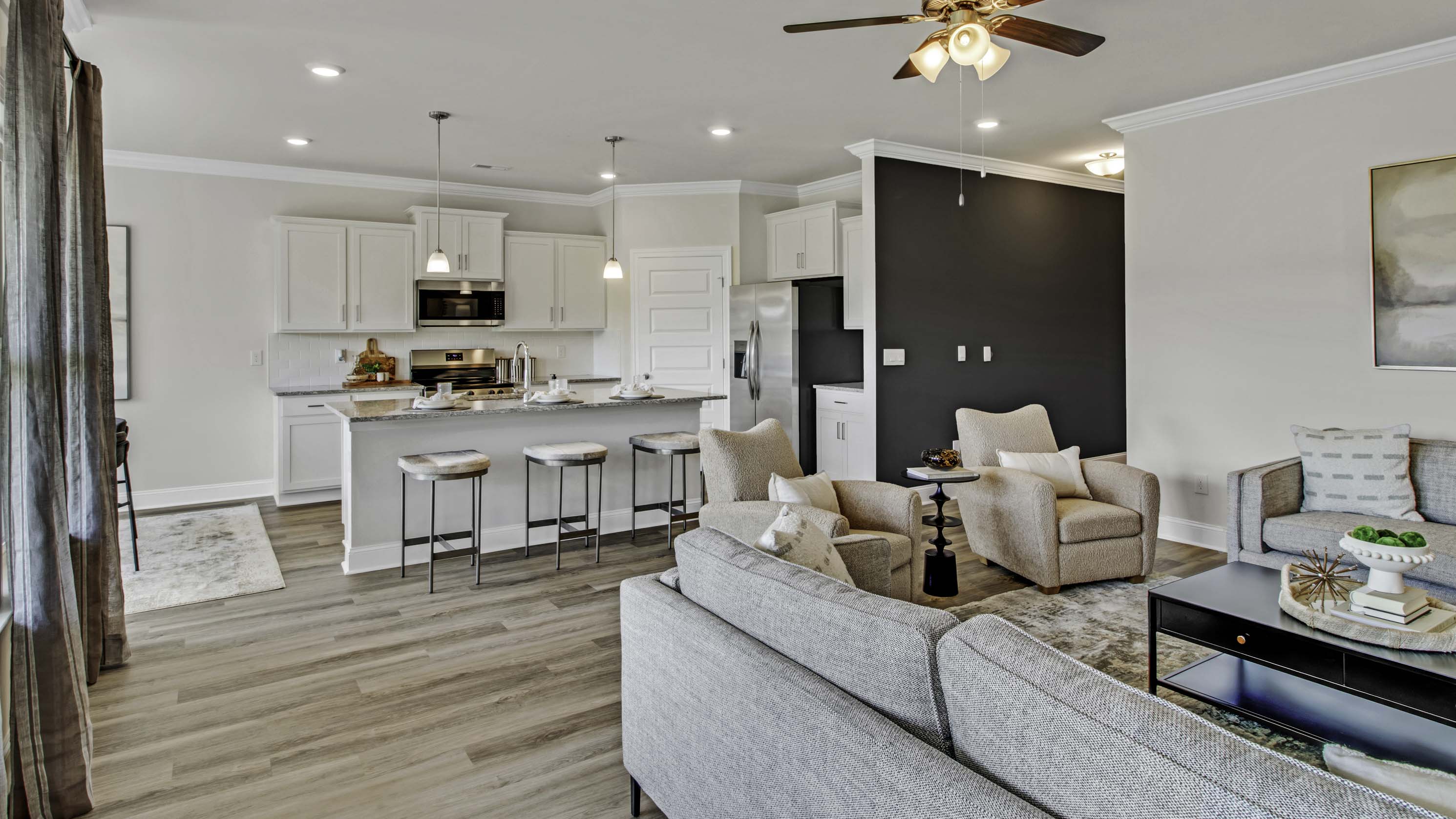 Open concept view of the living room overlooking the kitchen