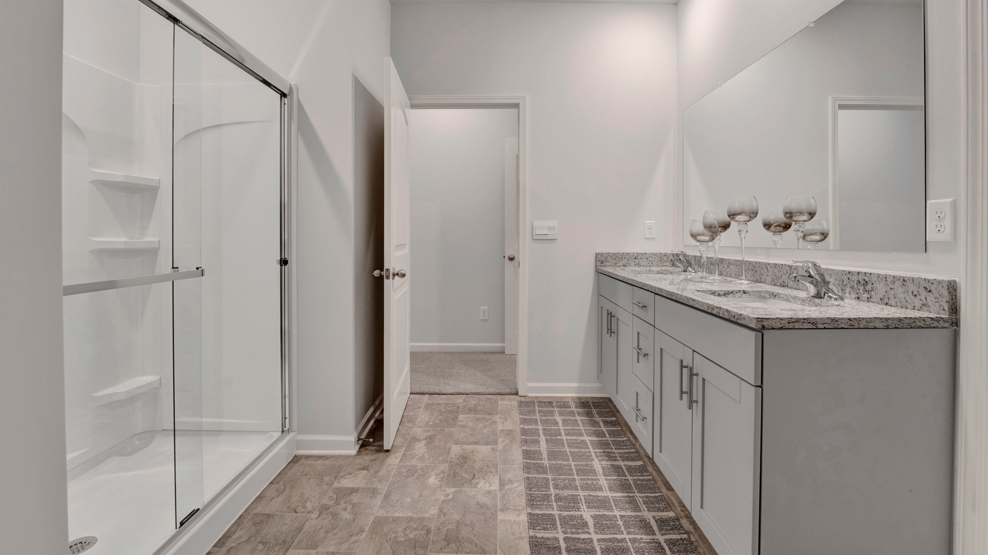 EN suite with a glass enclosed walk in shower