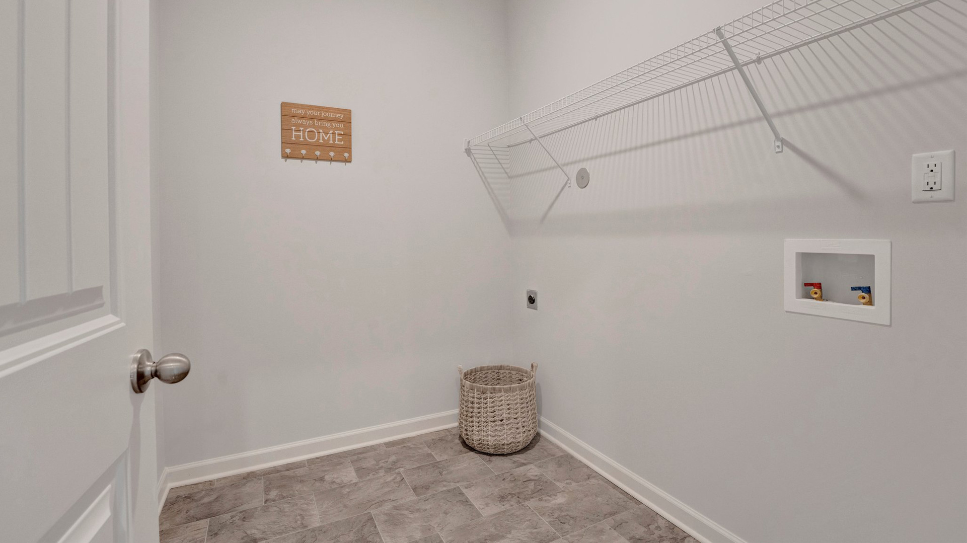 Laundry room with ventilated shelving