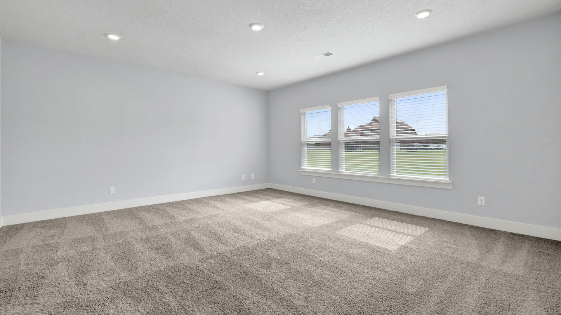 Spacious primary bedroom in Fraser plan of riverwood gardens