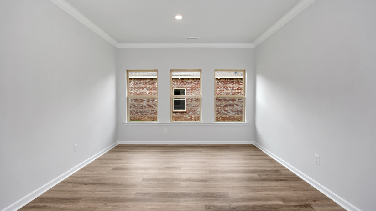 Beautiful dining area with tall windows for natural light