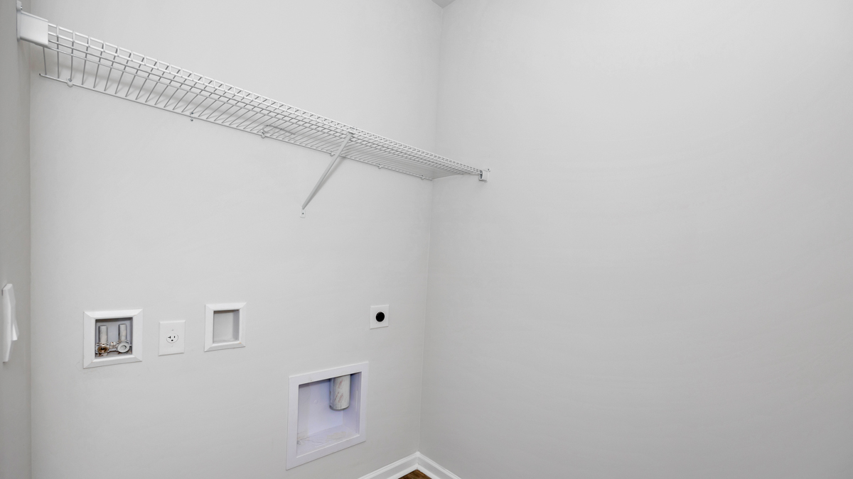 Laundry room with ventilated shelving
