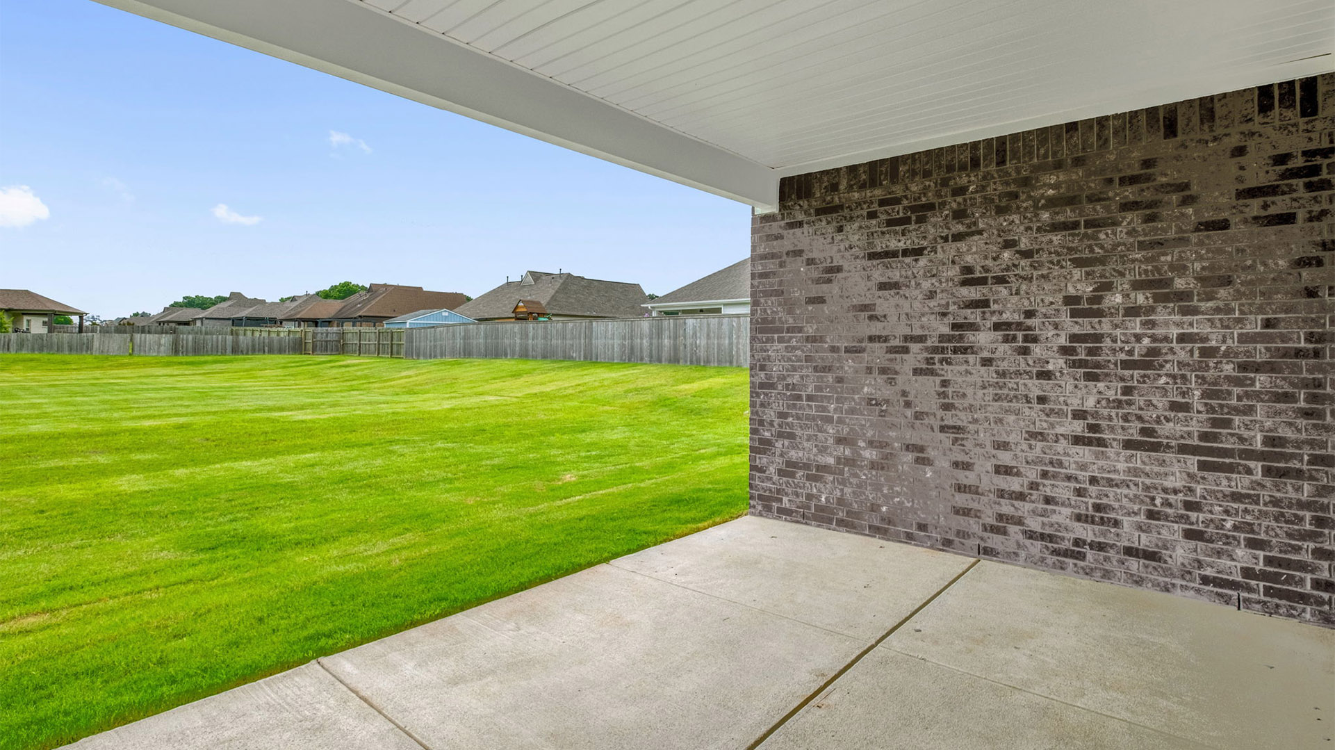 Spacious back covered patio