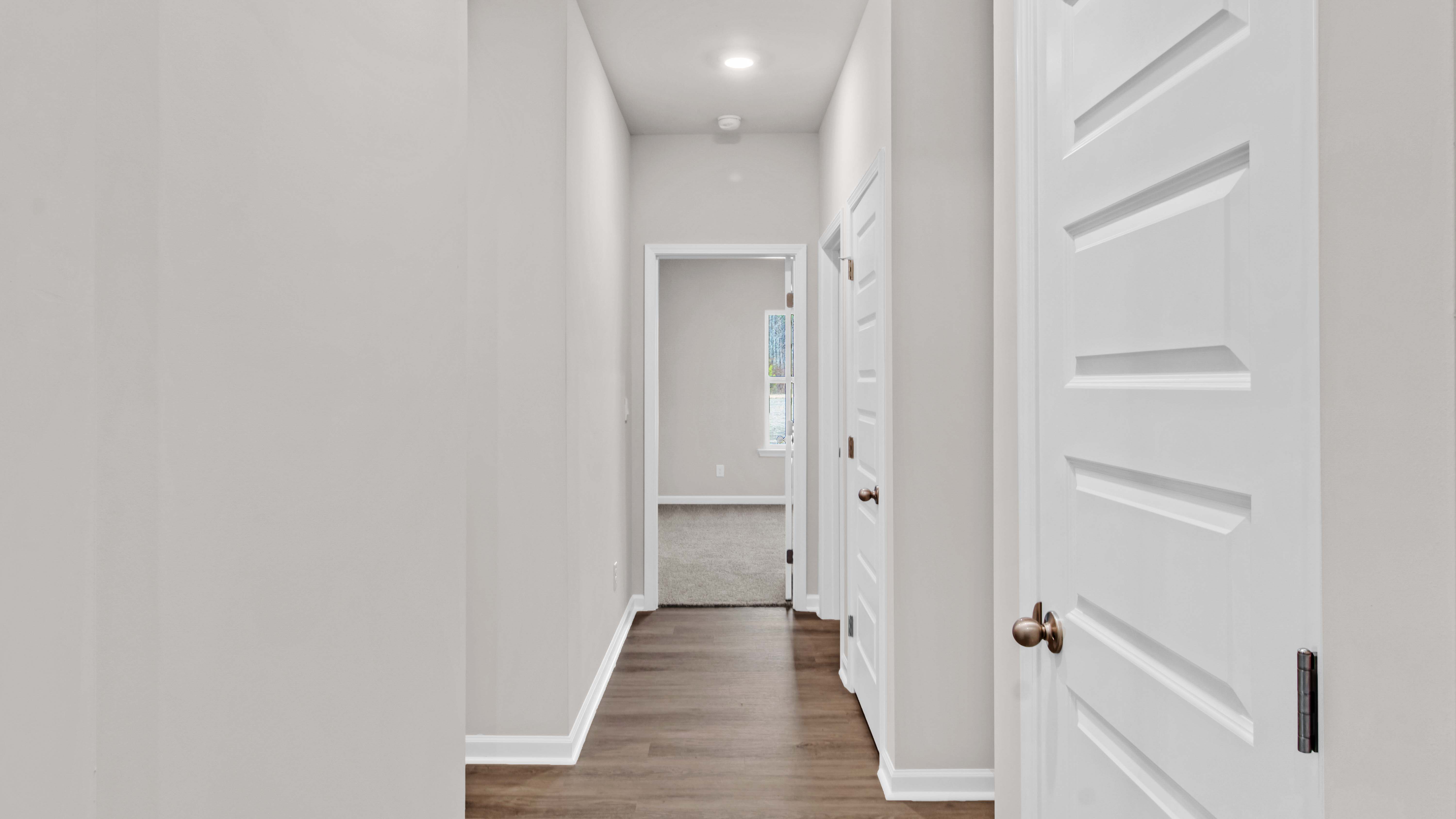 Entry hall leading down to the secondary bedrooms