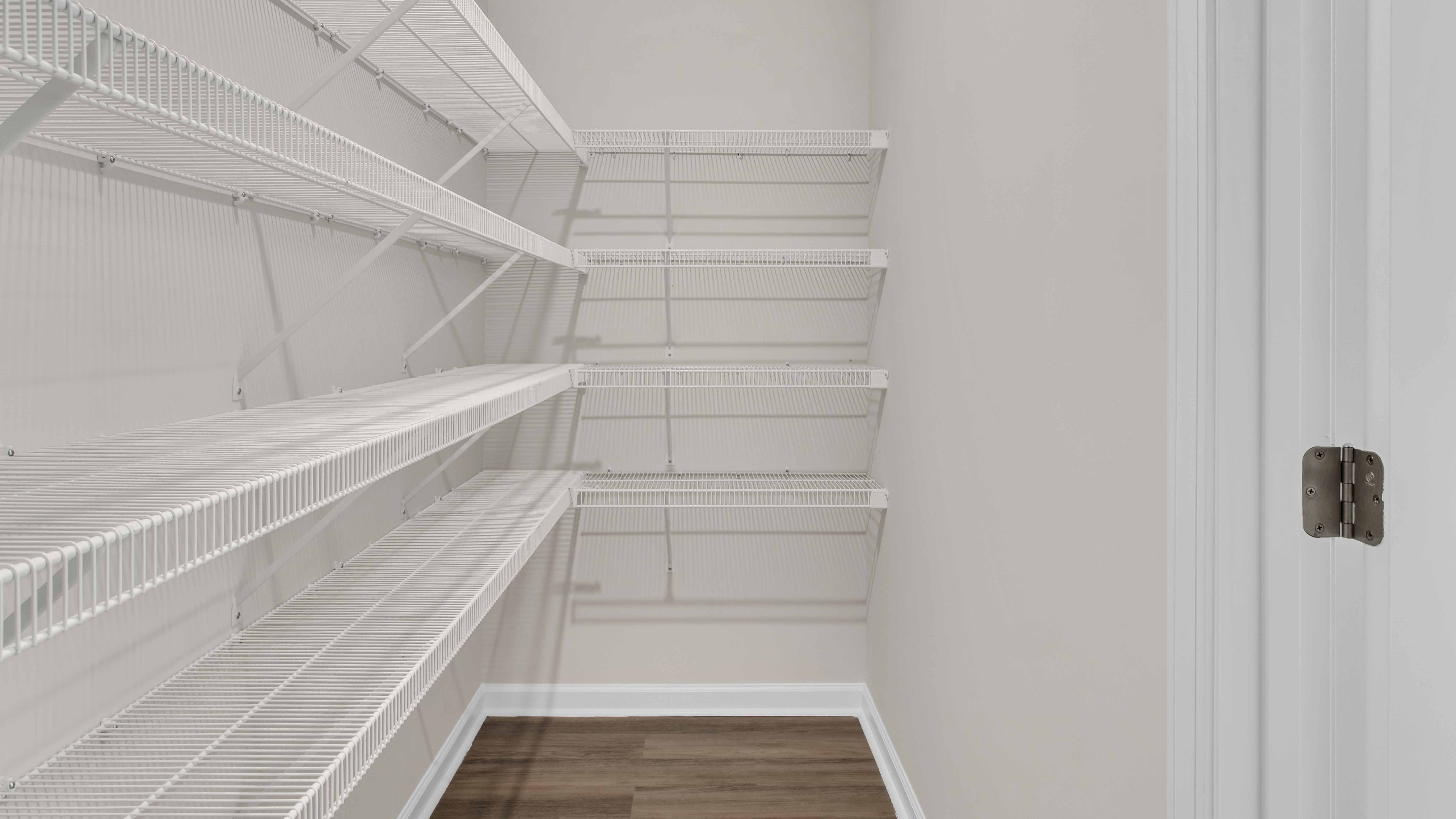 Spacious walk in pantry with ventilated shelving
