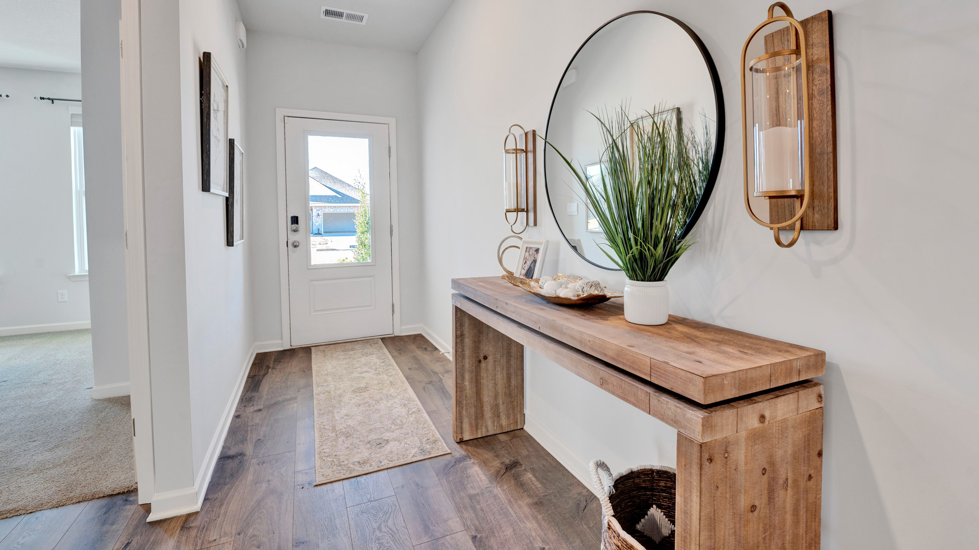Front door entryway leading into the secondary bedrooms